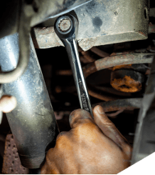 man using wrench